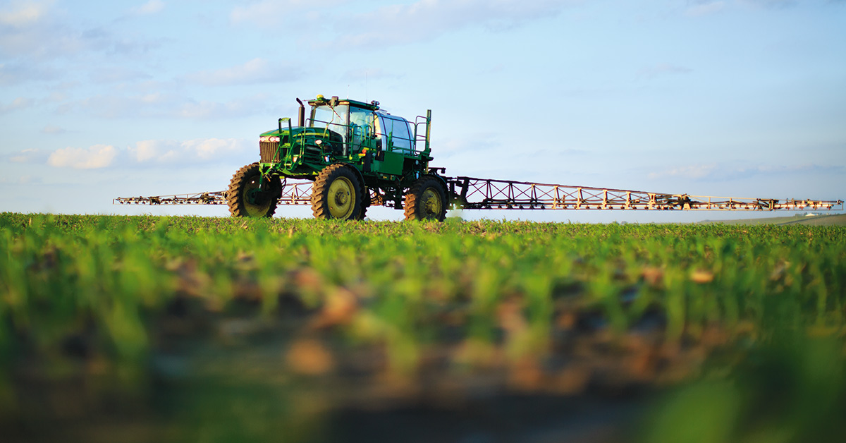 Ground level view sprayer in field